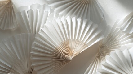 Artistic arrangement of paper fans creating unique textures.