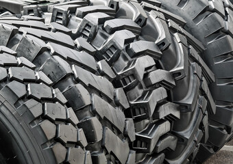 Close-up view of rugged tires designed for off-road vehicles captured in a display setting