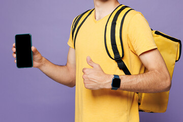 Young delivery guy employee man he wear cap t-shirt uniform workwear work as dealer courier hold...