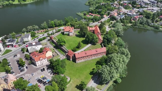Aerial view of Sztum Castle by Lake Zajezierskie in Sztum, Poland