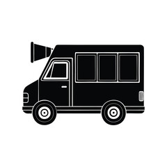 Silhouette of a black van with a megaphone on the roof