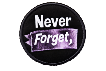 Circular black embroidered patch with Never Forget message, cut out transparent