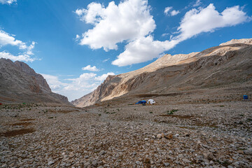 The scenic views of Demirkazık summit, Davlumbaz summit and dipsiz göl at the Aladağlar National park in Niğde, Turkey