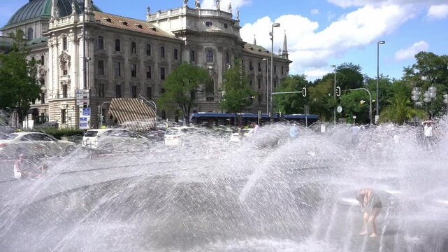 Karlsplatz square with District Court in Munich, Germany