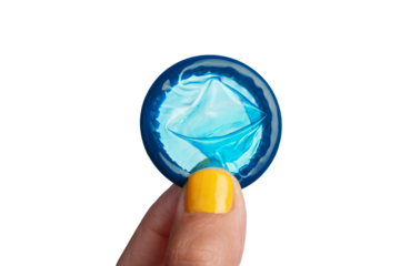 Macro shot of a blue condom held between fingers with yellow nail polish, isolated on transparent background, emphasizing safe sex.