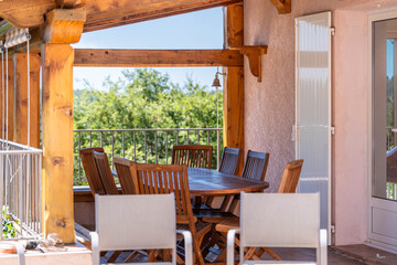 Sunny Outdoor Dining Area on a Mediterranean Terrace