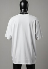 Blank white oversized t-shirt mockup shown from the back on a black mannequin