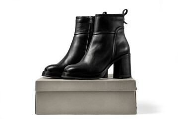 Female elegant high heeled leather ankle boots. Isolated on a white background with clipping path...