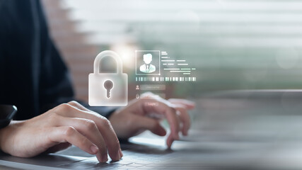 Hands typing on a laptop with a floating lock icon and login interface, symbolizing cybersecurity,...