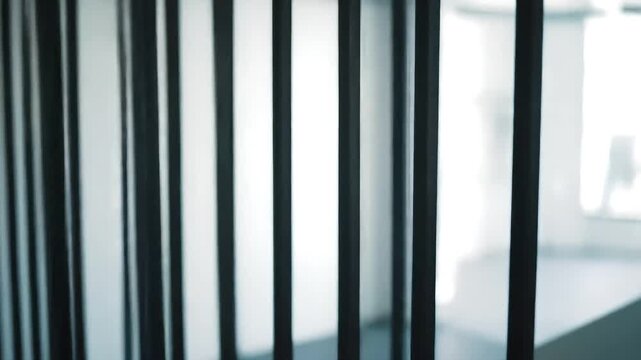 Modern interior Black vertical lines against white wall, blurred background, design texture
