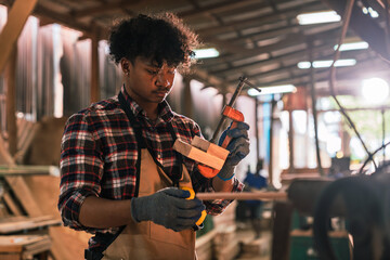 Carpenter Working in Timber Workshop Using Hand Tools to Craft Wood with Skill, Focus, and...
