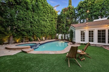 Storybook Traditional with Lush Backyard, Pool, Spa, and String Lights