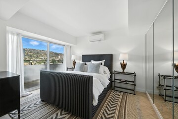 Sophisticated View Condo with Designer Finishes in Prime Location