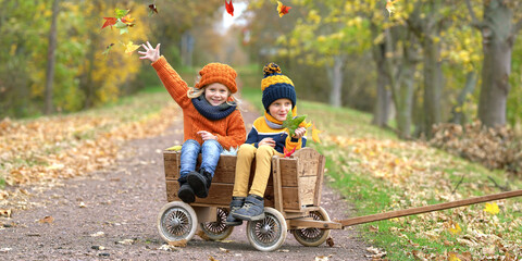 joyful Autumn Adventures: Happy Children in a Colorful Fall Wonderland