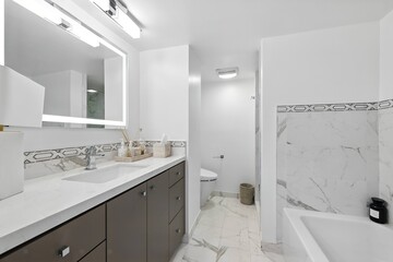 Sophisticated View Condo with Designer Finishes in Prime Location