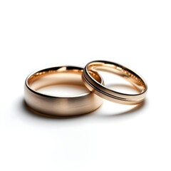 Wedding rings isolated on white background for love, marriage ceremony, engagement concept, gold jewelry design, or romantic symbol