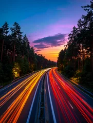 Handdoek met foto Snelweg bij nacht Vibrant light trails on a winding forest highway at sunset  © Mikhail Vorobev