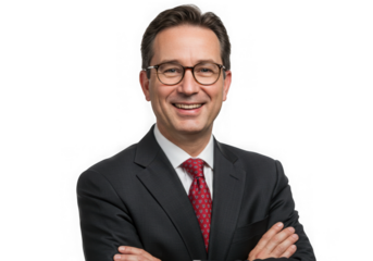 Smiling man in suit with arms crossed on transparent background