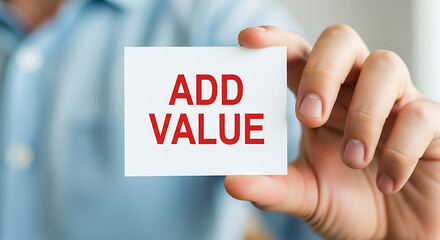 Person Holding Add Value Card Red Text White Background