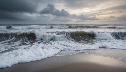 Coastal Drama: Waves crash onto the shore beneath a dramatic sky filled with ominous, gray clouds. This coastal scene evokes the raw power and beauty of the ocean.