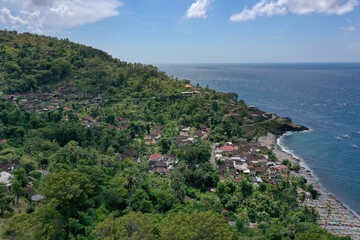 Fototapeta premium Drone Panorama of a Tropical Fishing Bay with Traditional Boats in Bali