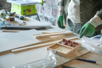 Caucasian craftsman working in a workshop.