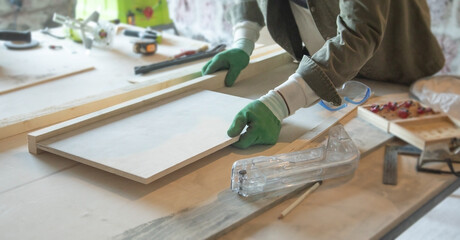 Caucasian craftsman working in a workshop.