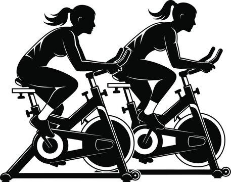 Two women are exercising on spinning bikes.