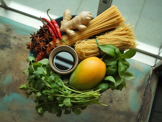 Varied food carbohydrates protein vegetables fruits dairy legumes on wood