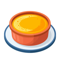 Golden yellow creamy soup in a rustic terracotta bowl on a blue saucer.