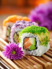 Colorful sushi rolls with flower decoration