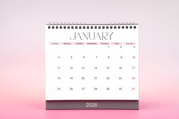 Desktop monthly calendar for January 2026 on pink color background.