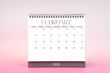 Desktop monthly calendar for February 2026 on pink color background.