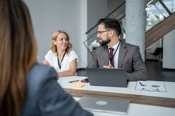 Business people discussing during corporate meeting in office