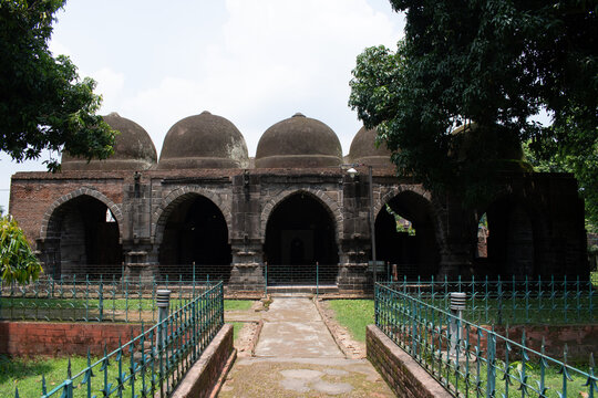 zaffar khan ghazi dargah at tribeni, arched islamic shrine amid greenery
