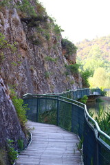 River flowing through a rocky canyon with a wooden walkway. Incesu canyon,Corum,Turkey