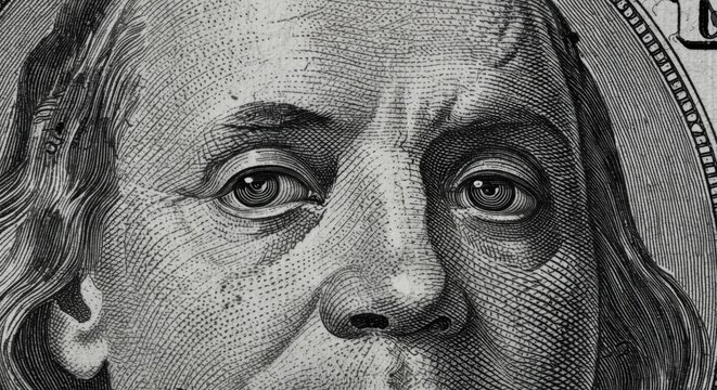 Extreme close-up of Benjamin Franklin's eyes on a dollar bill