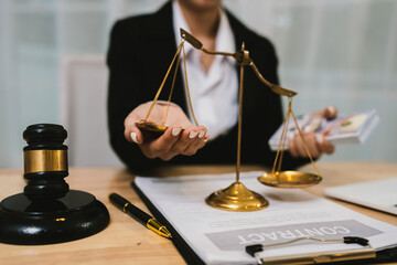 A lawyer in formal attire holds money and balances scales of justice, symbolizing legal decisions,...