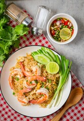 Fried rice with shrimps on a white plate