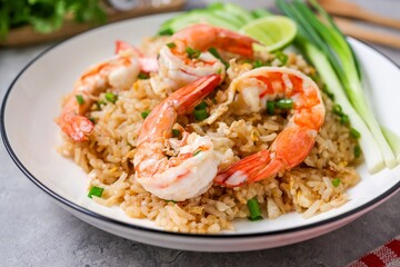 Close up of Fried rice with shrimps on a white plate