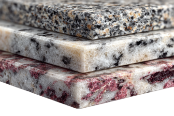 Three granite slabs stacked showing different colors and textures a close up view