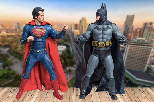 Bangkok, Thailand - March 30, 2016 : Batman and Superman figure with building in background. They are superheros from movie franchise who appears in American comic books published by DC Comics.
