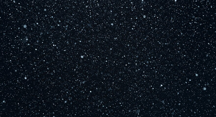 Fototapeta premium Falling Snow Creating a Dark Blue Background Ideal for Winter Designs