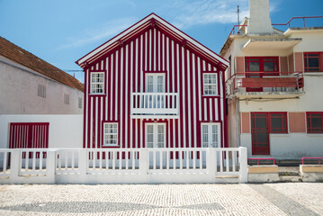 Colorful Striped Houses in Costa Nova, Aveiro, Portugal on a Sunny Day