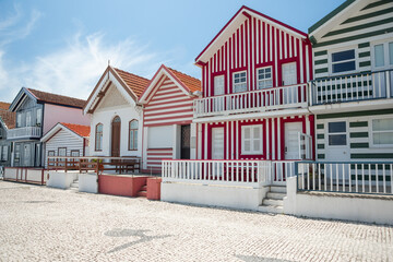 Colorful Striped Houses in Costa Nova, Aveiro, Portugal on a Sunny Day