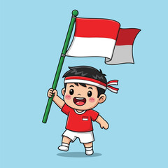 Happy Indonesian boy proudly holds national flag high.