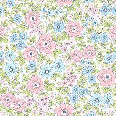 Beautiful floral pattern in small vintage flowers. Small pink and blue flowers. White background. Liberty print. Floral seamless background. Gentle template for fashion prints. Stock pattern. Vector

