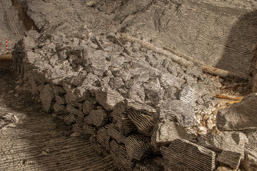 Interior of the Dossena mine with colored stones for an artistic installation.