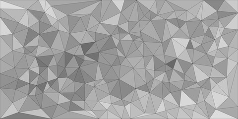 Abstract grayscale low poly background with various shades of gray forming a complex triangular mosaic pattern.

