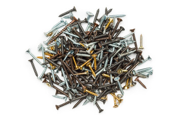 Top view of bunch metal fasteners on white background.